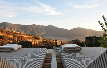 Lounge chairs overlooking a mountain